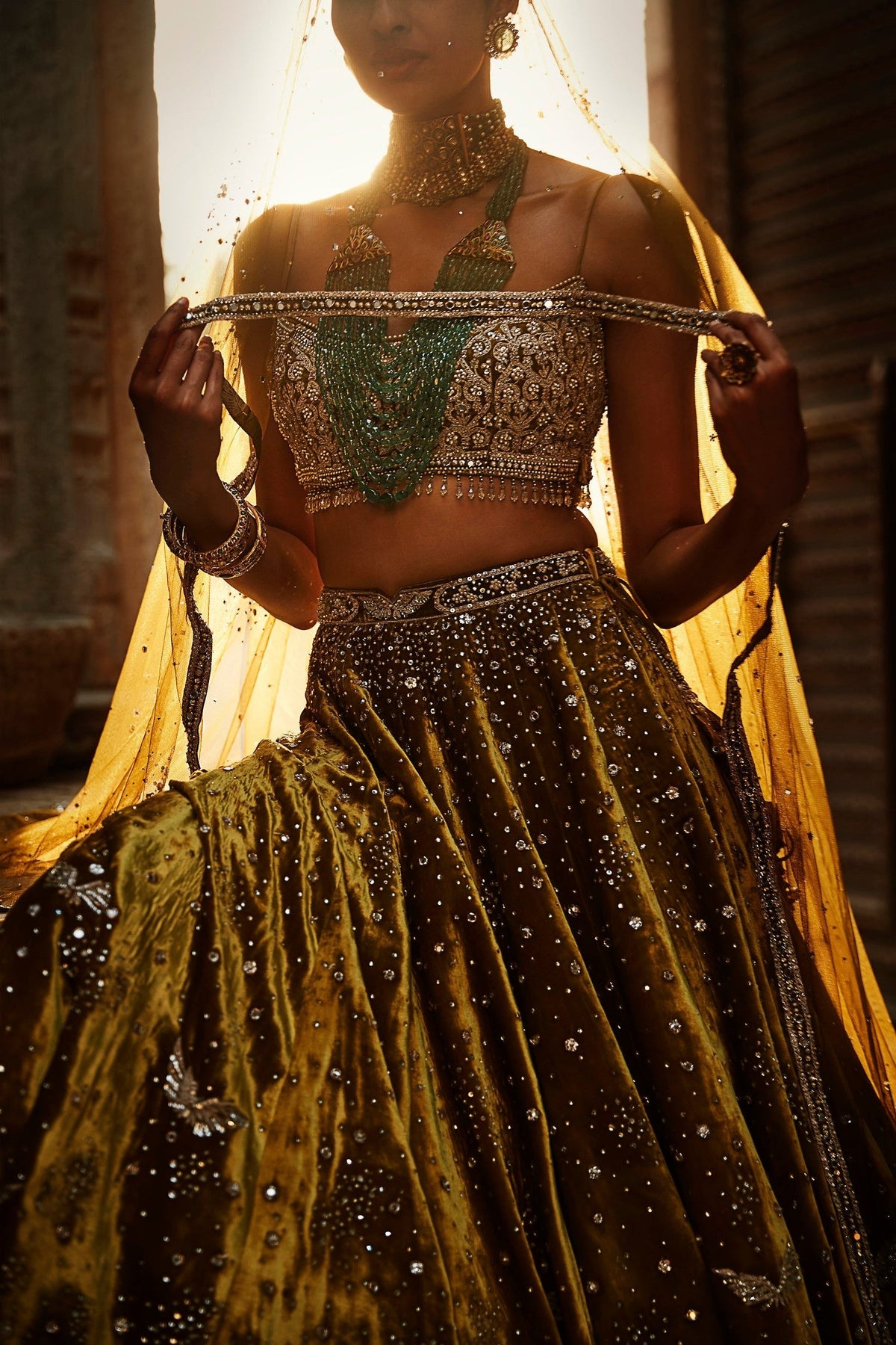 The Burnt Sunset Green Winged Lehenga