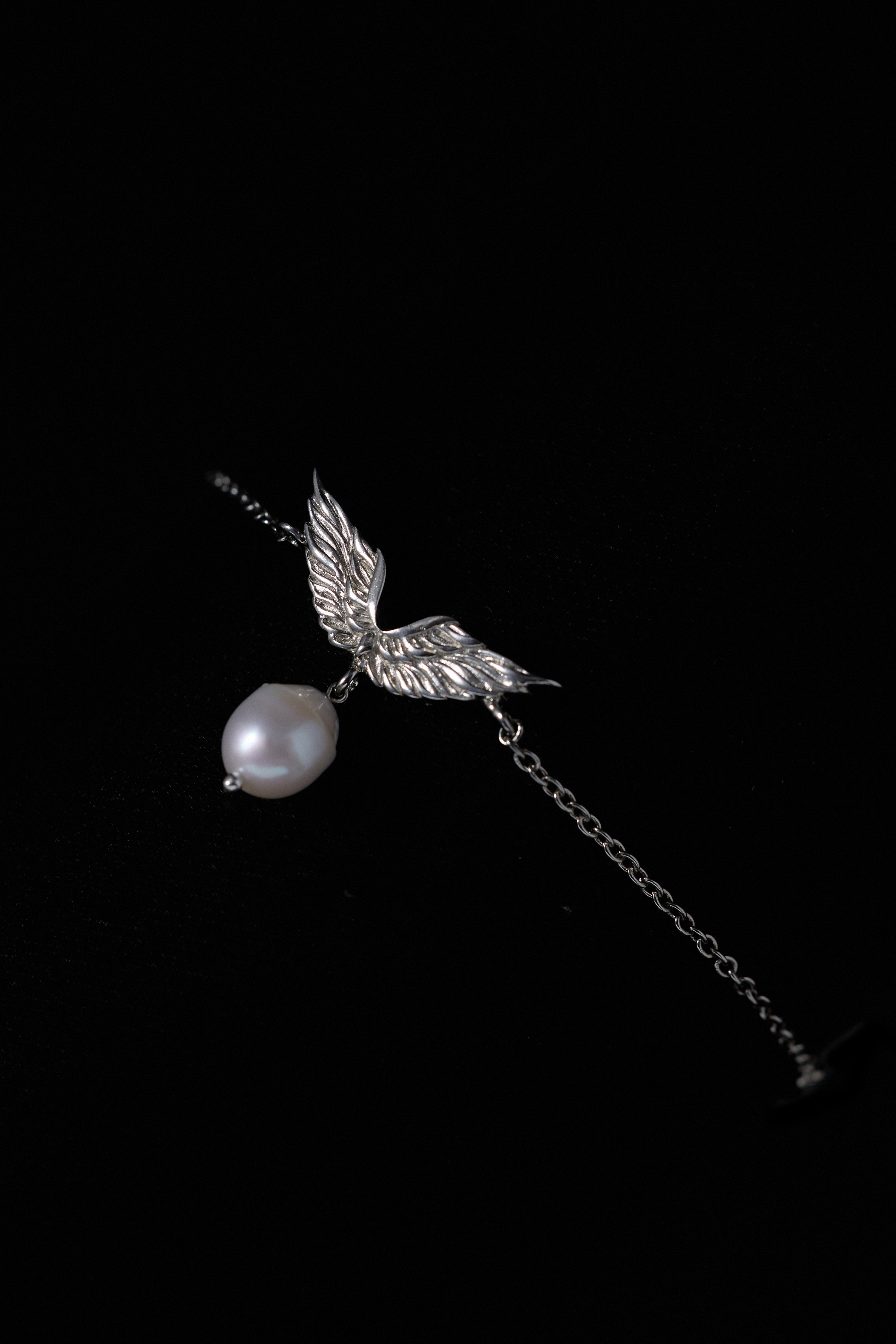 The Matsya Wing Sea Droplet Bracelet in Starlight